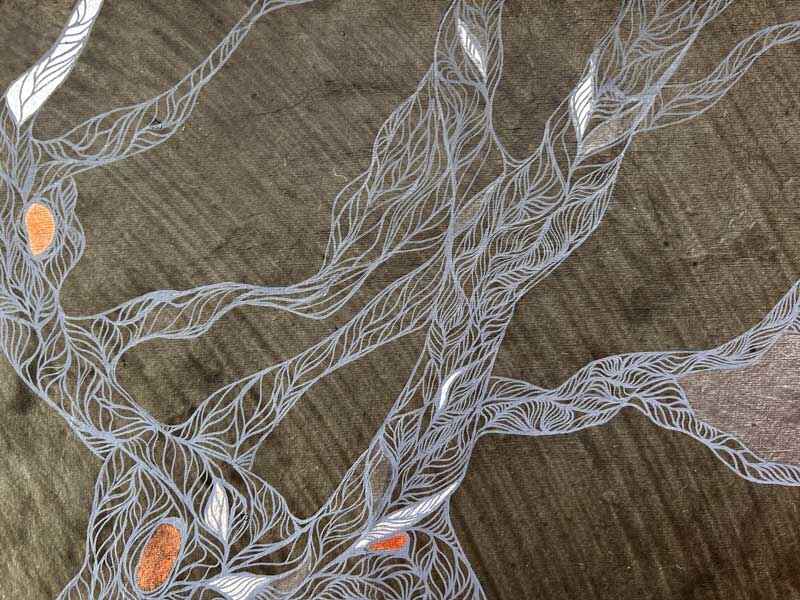 Detail of abstract drawing representing gnarly tree trunks and branches in the Turia park in Valencia, Spain. Fine acrylic markers on heavily textured grey handmade paper