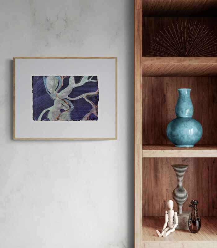 Painting representing colourful underwater creatures and weeds, framed and hanging on a white wall next to wooden shelving. 